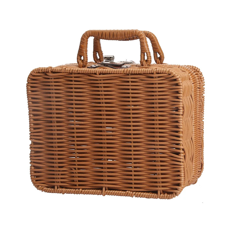 Rectangular wicker basket with rounded edges and a sturdy handle. The woven design is uniform, giving it a classic, natural look.
