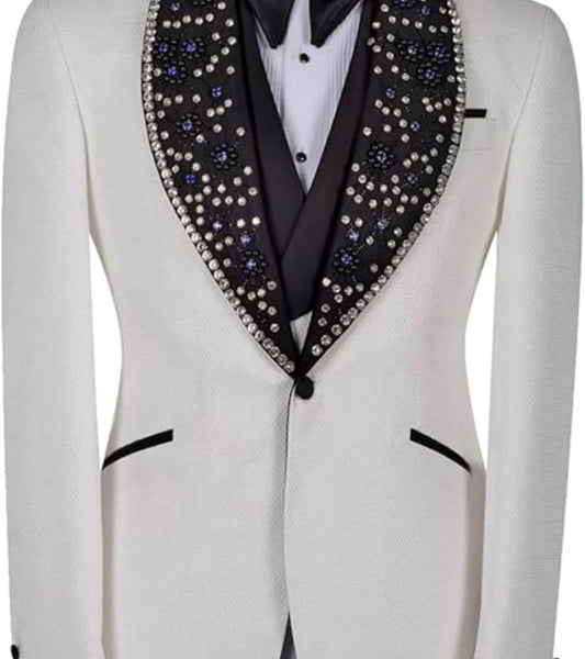 White suit jacket with black embellished lapels featuring blue and silver accents. The jacket has black pocket details and is layered over a shirt with a black buttoned center.