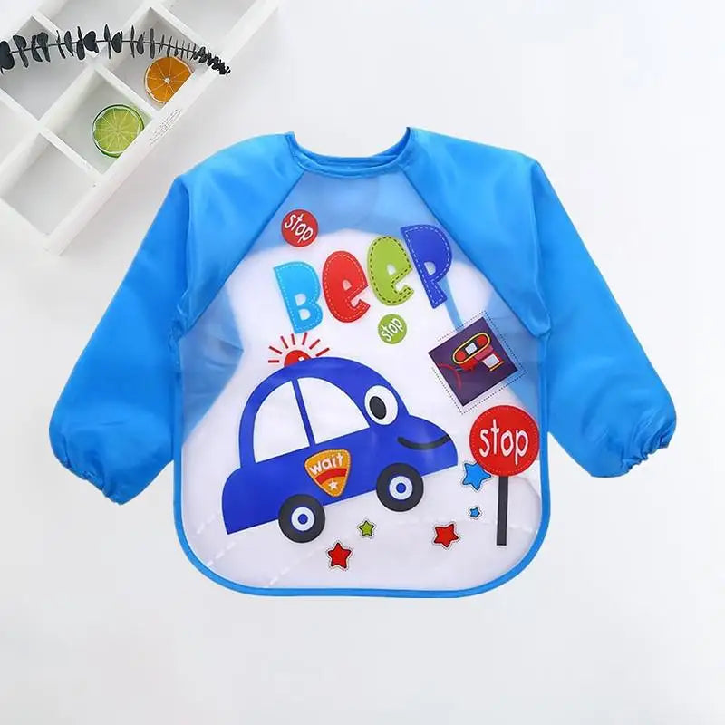 Blue children's bib with cartoon car design, colorful "Beep" text, stop signs, and stars. The bib has long sleeves and is laid out flat against a light background.