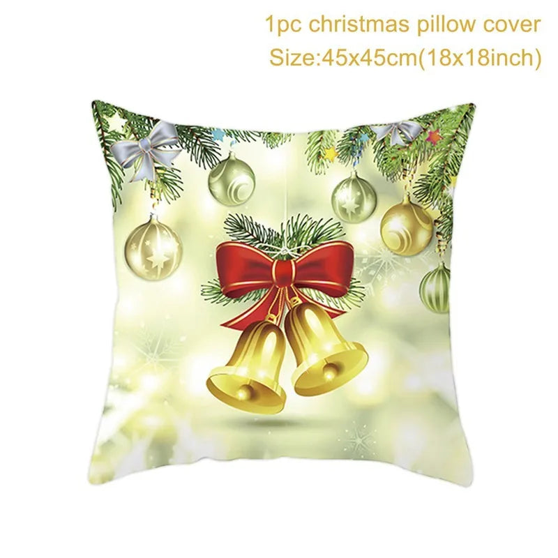 Festive pillow cover with gold bells tied with a red ribbon, surrounded by ornaments and garlands. Text reads "1pc Christmas pillow cover, Size: 45x45cm (18x18 inch)" on a light background.