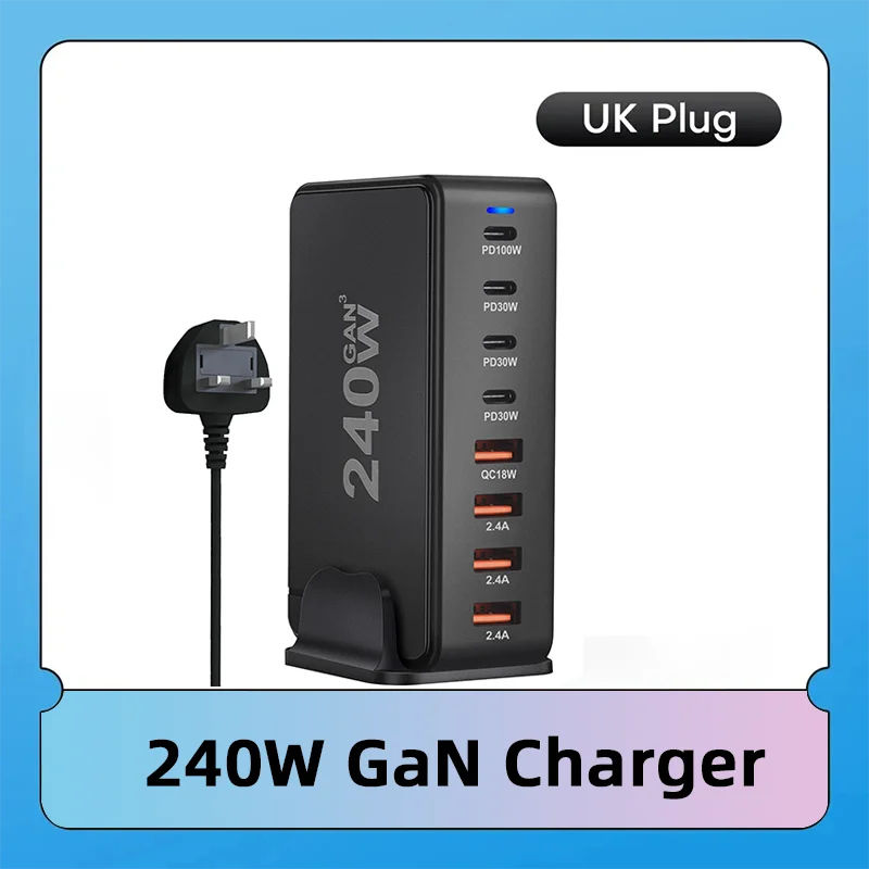 Black 240W GaN charger with UK plug, featuring six charging ports: four USB-C (100W, 30W) and two USB-A (18W, 2.4A). Displayed on a gradient blue background.