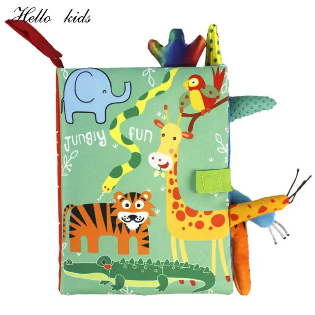 Soft children's book with colorful jungle animals: elephant, giraffe, tiger, parrot, alligator, and snake on the cover. Text reads "jungly fun." Fabric tabs protrude from edges.
