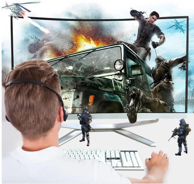 A gamer wearing a headset and holding a mouse is immersed in an action-packed video game on a large monitor displaying explosions, vehicles, and intense combat scenes.