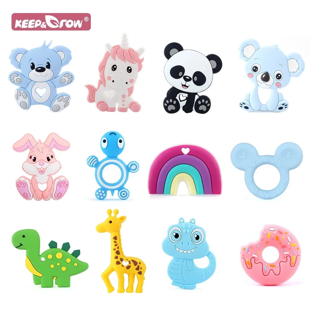 Colorful silicone baby teethers in various shapes, including animals, a unicorn, a rainbow, and a donut. Upper left logo reads "Keep & Grow."