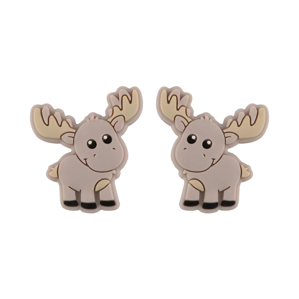 Two cute, cartoonish moose figures with large eyes and smiling faces, featuring beige bodies and antlers, standing side by side on a white background.