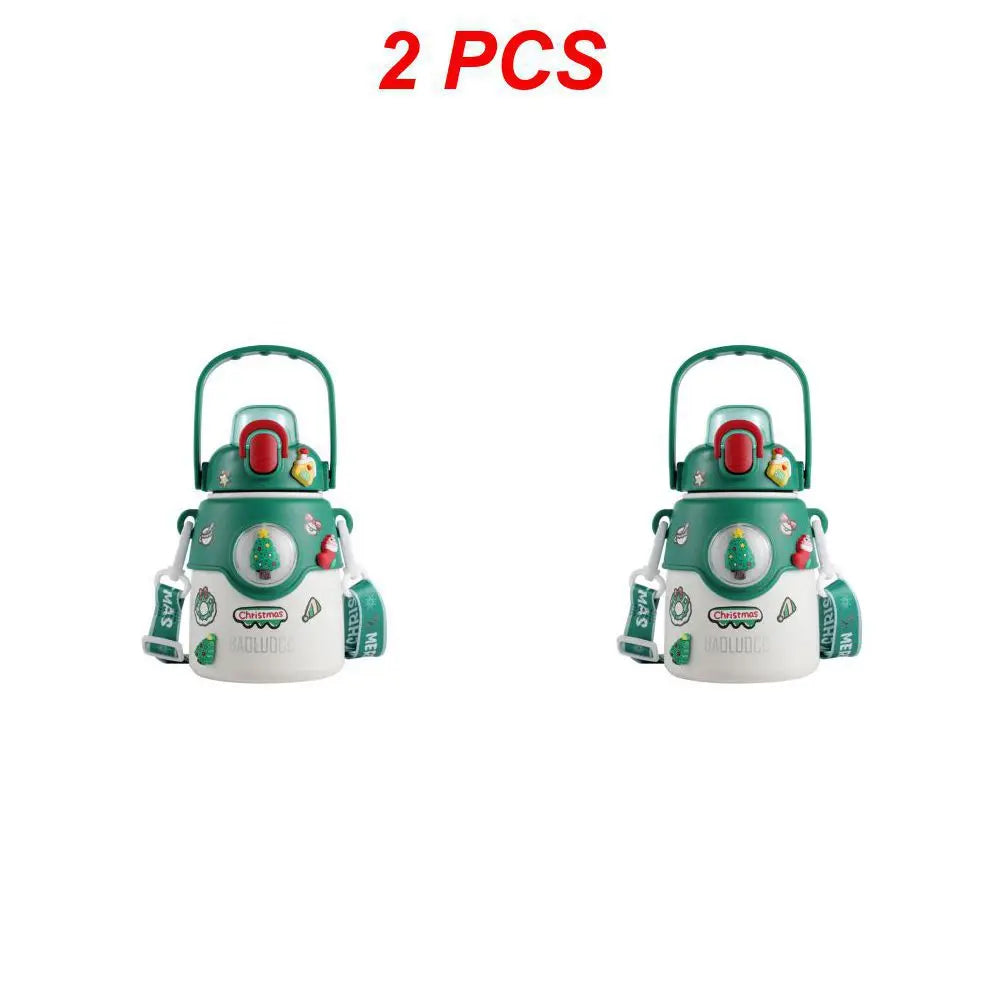 Two green and white Christmas-themed water bottles with handles, featuring holiday decorations and straps, are displayed side by side. Text above reads "2 PCS" in red.