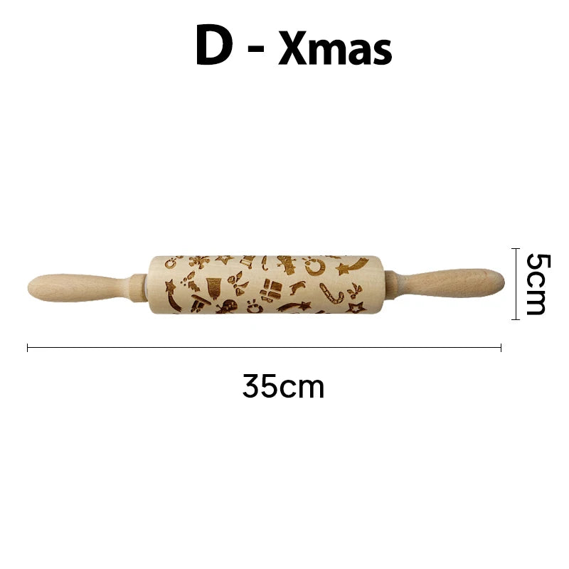 Wooden rolling pin with engraved Christmas patterns, measuring 35cm in length and 5cm in diameter. Labeled "D - Xmas" at the top of the image.