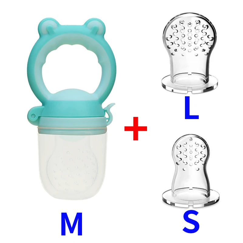 A baby food feeder with a teal handle and two transparent silicone nipples in large (L) and small (S) sizes. The feeder has a medium (M) size silicone nipple attached.