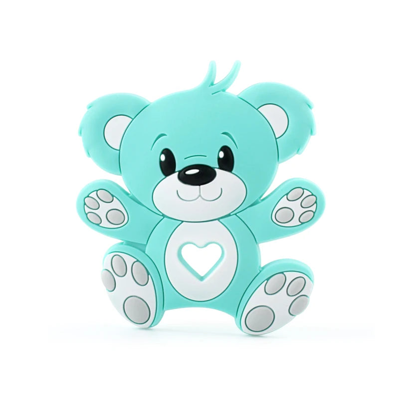 Cute turquoise teddy bear illustration with a smiling face, round ears, and paws showing. It has a white heart on its belly, creating a playful and friendly appearance.