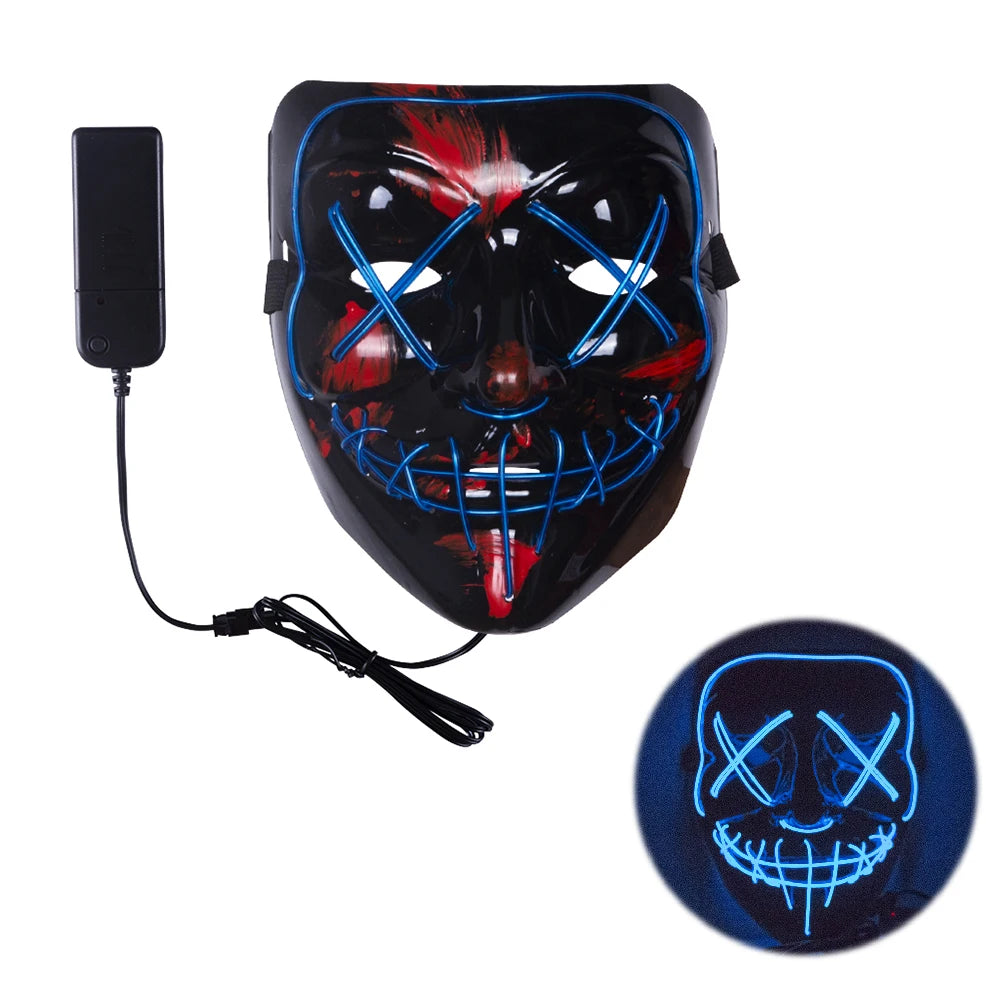 LED mask with glowing blue and red design. Features stitched mouth and cross eyes pattern. Includes a handheld power pack connected by a wire. Inset shows mask glowing in the dark.