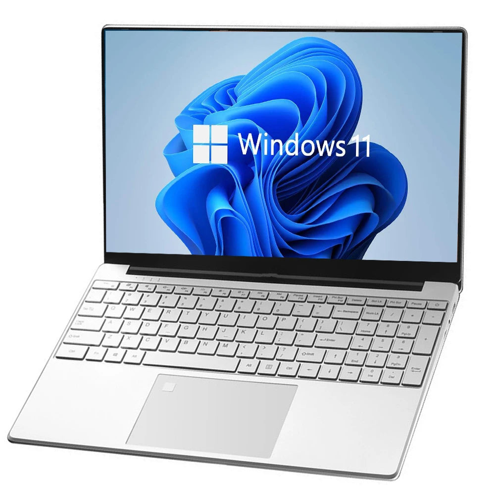 A sleek silver laptop with a Windows 11 logo on its screen, featuring a thin bezel design and a spacious keyboard with a large touchpad on a white surface.