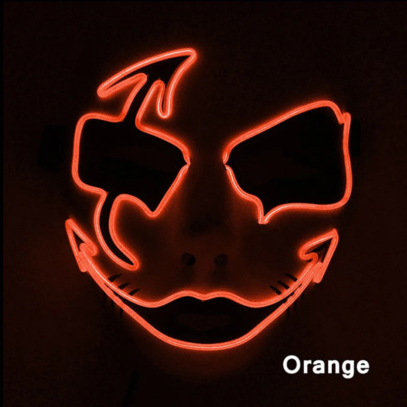 Glowing orange LED mask with menacing eyes and a wide, twisted smile on a black background. The word "Orange" is displayed in the bottom right corner.