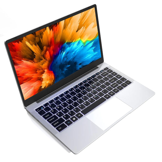 Open laptop with a silver body, black keyboard, and vibrant, colorful display showcasing an explosion of orange, red, blue, and yellow hues.