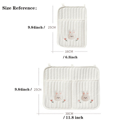 Two quilted white cloths with embroidered rabbit faces, one measuring 9.84x6.3 inches and the other 9.84x11.8 inches, shown with size dimensions in inches and centimeters.