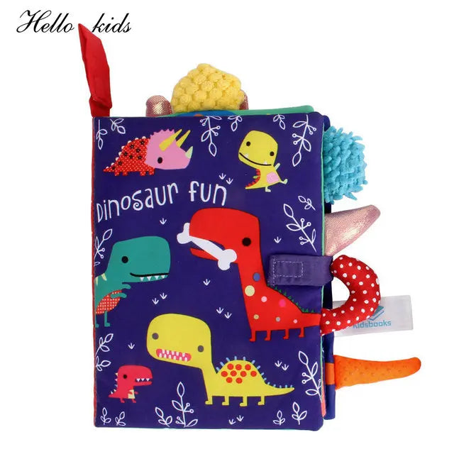 Soft, colorful children's book titled "Dinosaur Fun" with whimsical dinosaur illustrations. The book has various textures and tabs, promoting sensory exploration for kids.
