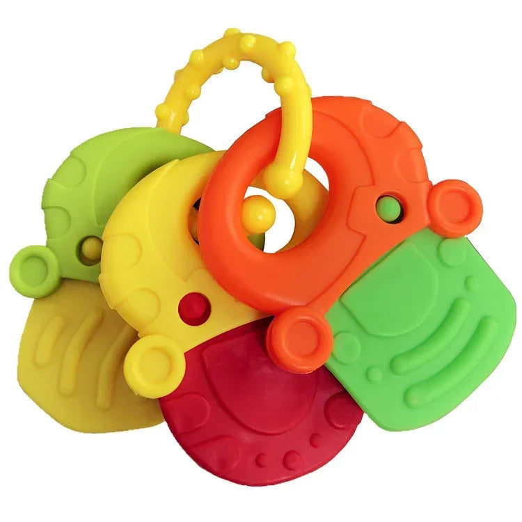 Colorful baby teething toy with red, green, yellow, and orange keys attached to a yellow ring. Textured surfaces for sensory stimulation and soothing gums.