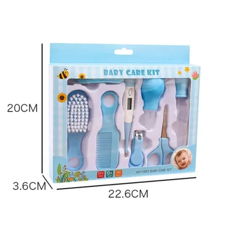 Baby care kit in a blue box measuring 22.6cm by 20cm by 3.6cm. Includes a brush, comb, thermometer, nasal aspirator, scissors, and more. Features bee and sun illustrations.