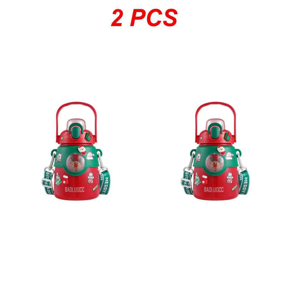 Two festive red and green insulated bottles with handle lids, decorated with holiday-themed images and "BAOLUOCC" text. A strap labeled "Merry" is attached to each. Text above reads "2 PCS."