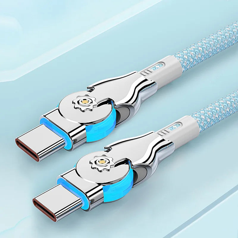 Two USB-C cables with silver, gear-shaped connectors and braided blue wires on a light blue background, featuring an LED indicator and sleek metallic design.