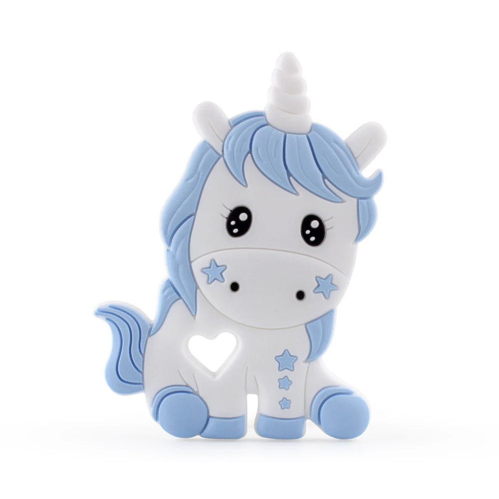 Cute cartoon unicorn with blue mane and tail, featuring star decorations and a heart-shaped cutout. The unicorn looks forward with wide, friendly eyes.