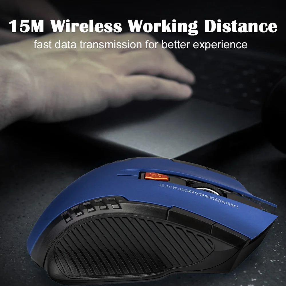 Blue and black wireless gaming mouse on a dark desk with a laptop. Text reads "15M Wireless Working Distance, fast data transmission for better experience."