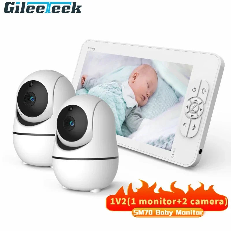 Baby monitor set with two cameras and a 7-inch HD screen displaying a sleeping baby. Controls are on the right of the screen. Text reads "1 monitor + 2 cameras, SM70 Baby Monitor."