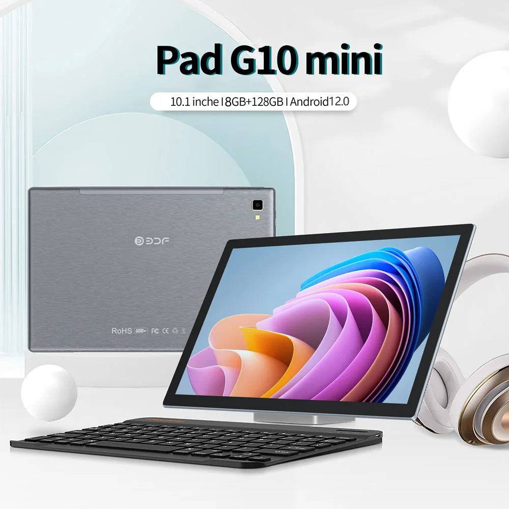 Pad G10 mini displayed with a detachable keyboard and modern headphones, featuring a 10.1-inch screen, 8GB+128GB storage, and Android 12.0, emphasizing sleek design and technology.