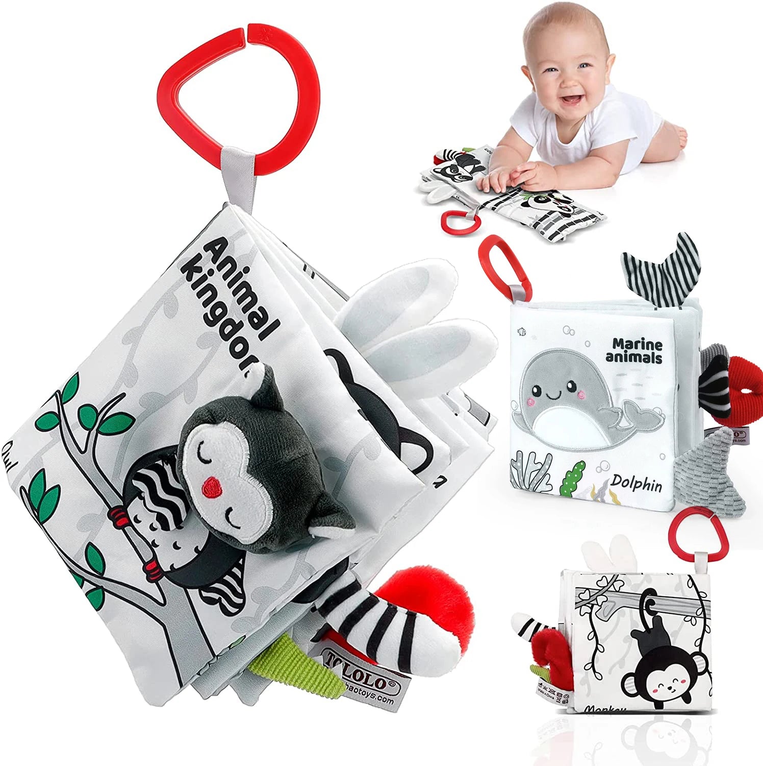 Soft baby books featuring animal illustrations and interactive plush toys, with a red ring clip. A baby is shown enjoying the book, lying on their stomach and smiling.