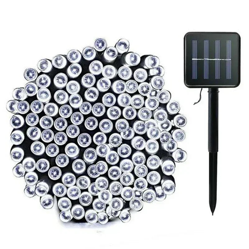 A bundle of bright LED lights connected to a solar panel with a stake for outdoor use, providing eco-friendly illumination.