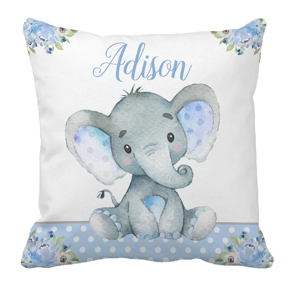Cute watercolor elephant on a decorative pillow with blue polka dots and floral corners. Features the name "Adison" in cursive above the elephant.