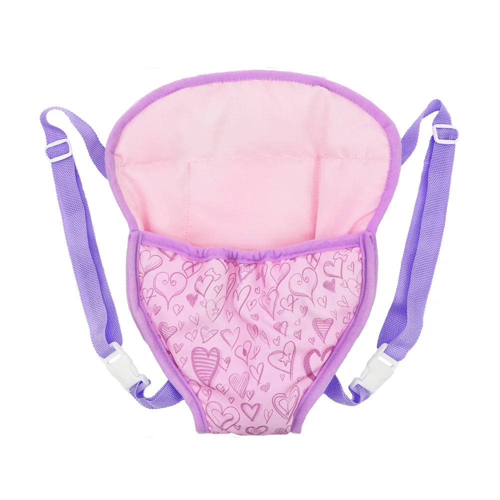 Purple and pink doll carrier with heart patterns, featuring adjustable purple straps and white buckles, designed for kids to carry dolls.
