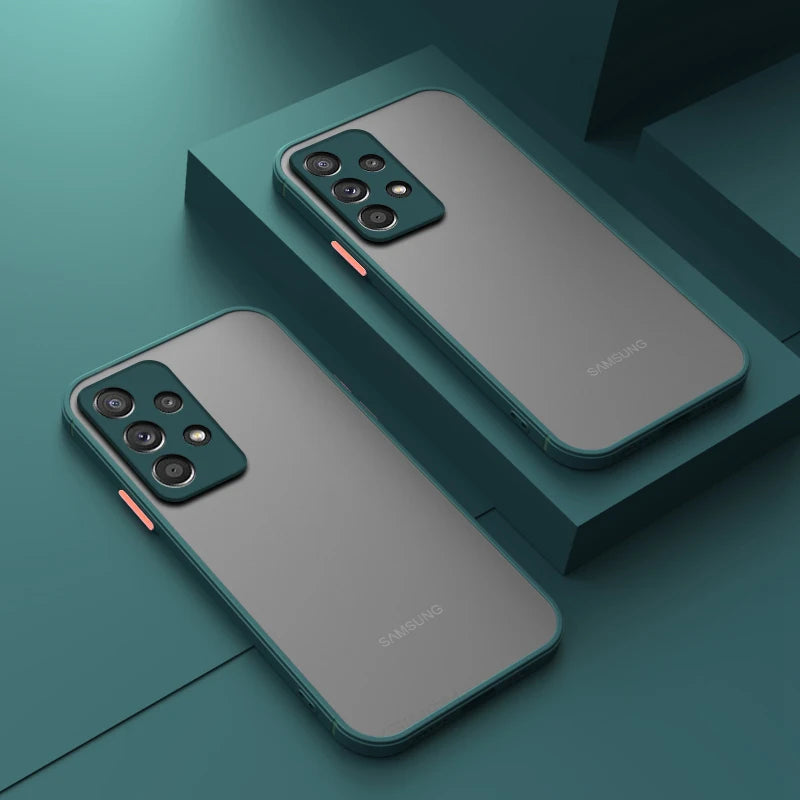 Two Samsung smartphones with a sleek green design and triple camera setups are displayed on a green surface, highlighting their modern aesthetics and features.