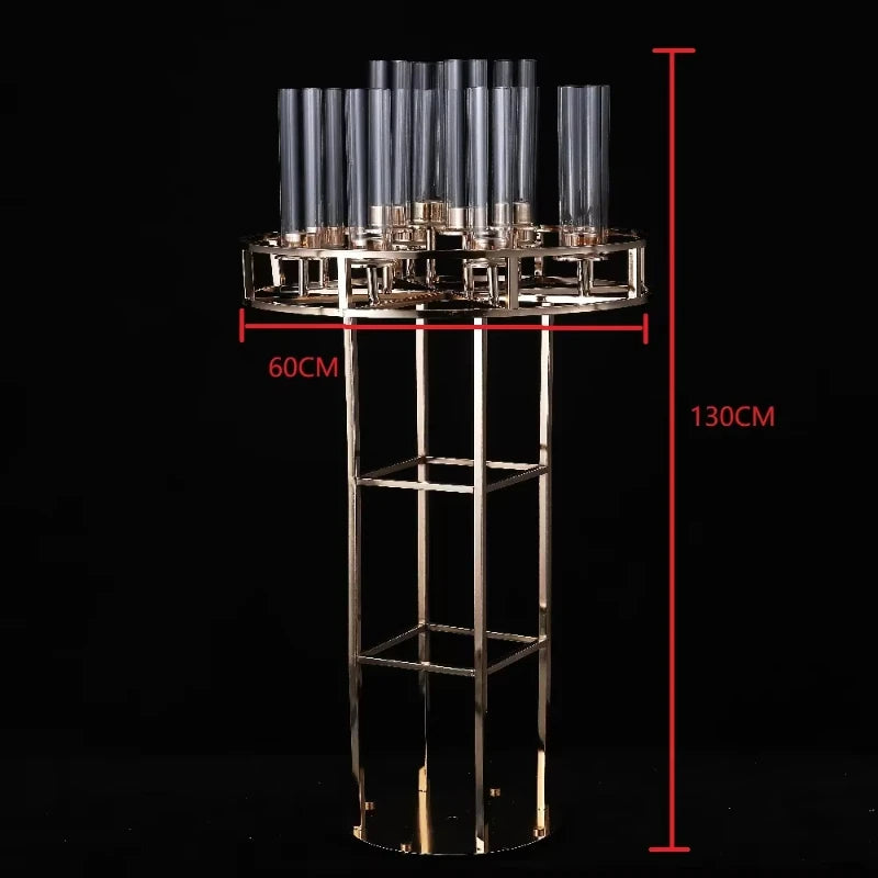 Tall golden candle holder stand with multiple glass holders on top, measuring 130cm in height and 60cm in width, against a black background.