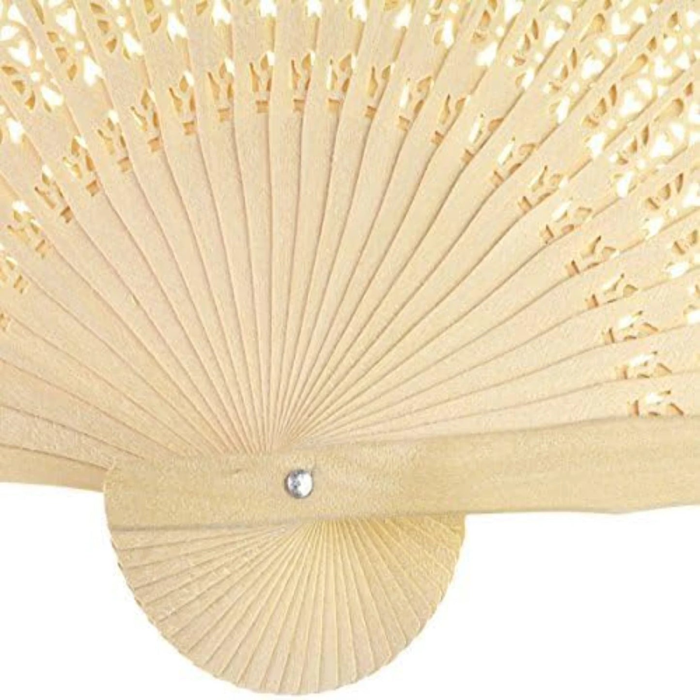 Close-up of a wooden folding fan with intricate cut-out patterns. A small metal fastener is visible at the pivot point, showing detailed craftsmanship.