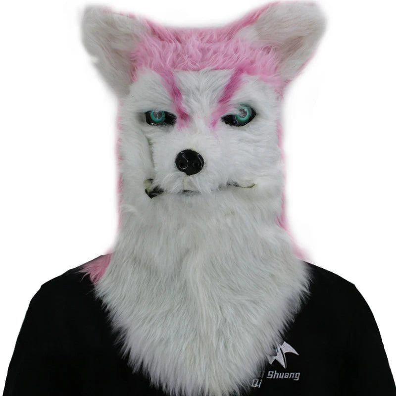 White and pink furry mask resembling a fox with piercing blue eyes, worn over a black outfit.