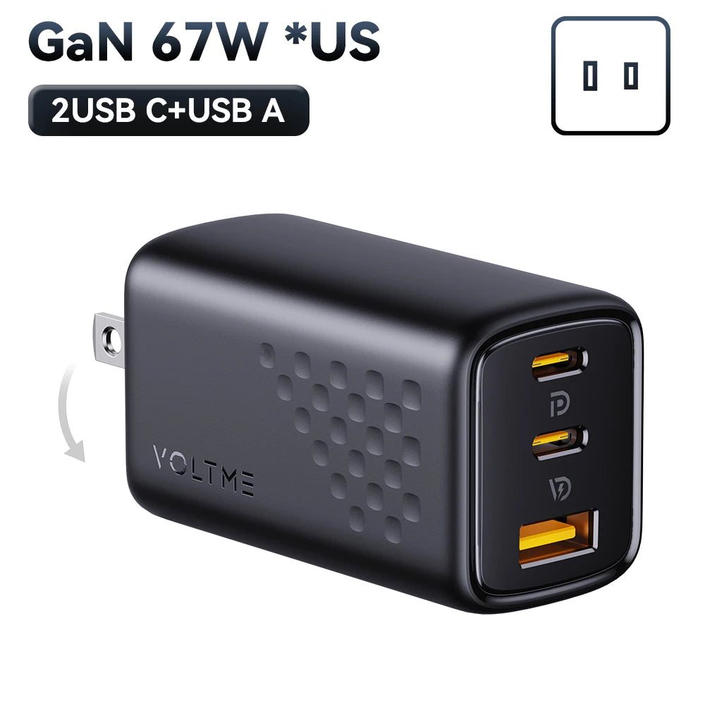 Black GaN 67W USB charger with two USB-C and one USB-A ports. Features foldable prongs for convenience. Brand: Voltme.