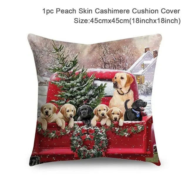 Cushion cover featuring a festive winter scene with seven Labrador puppies in a decorated red truck, surrounded by snow, a Christmas tree, and a house in the background.