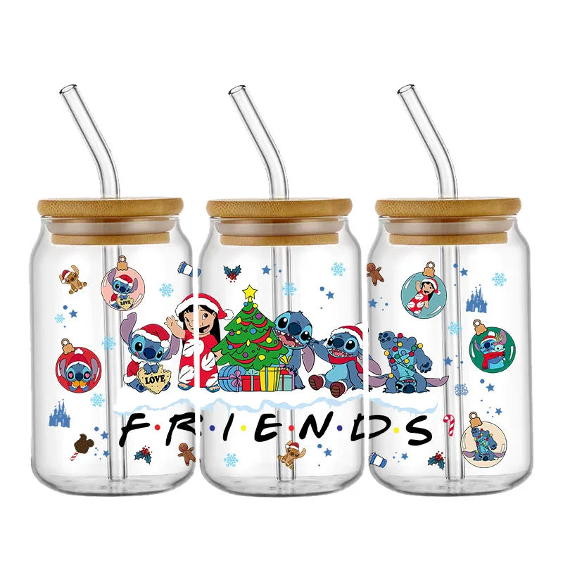 Three clear jars with bamboo lids and straws, adorned with festive cartoon characters, a Christmas tree, snowflakes, and the word "FRIENDS" in colorful letters.