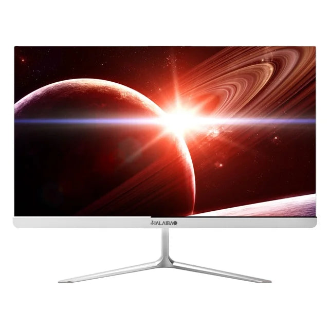 Ultrathin monitor with a space-themed wallpaper showing a glowing planet and rings, set against a starry background. The monitor has a sleek silver stand.