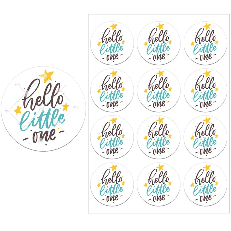 Round stickers with the phrase "hello little one" in playful black and turquoise script, adorned with small yellow stars. A sheet displays multiple stickers in a grid layout.