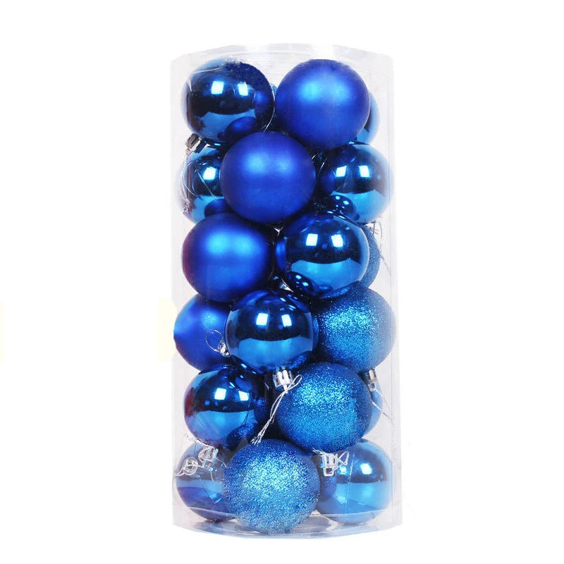 A clear container filled with shiny and matte blue Christmas ornaments, including glittery ones. The baubles are packed tightly and reflect light, creating a festive appearance.