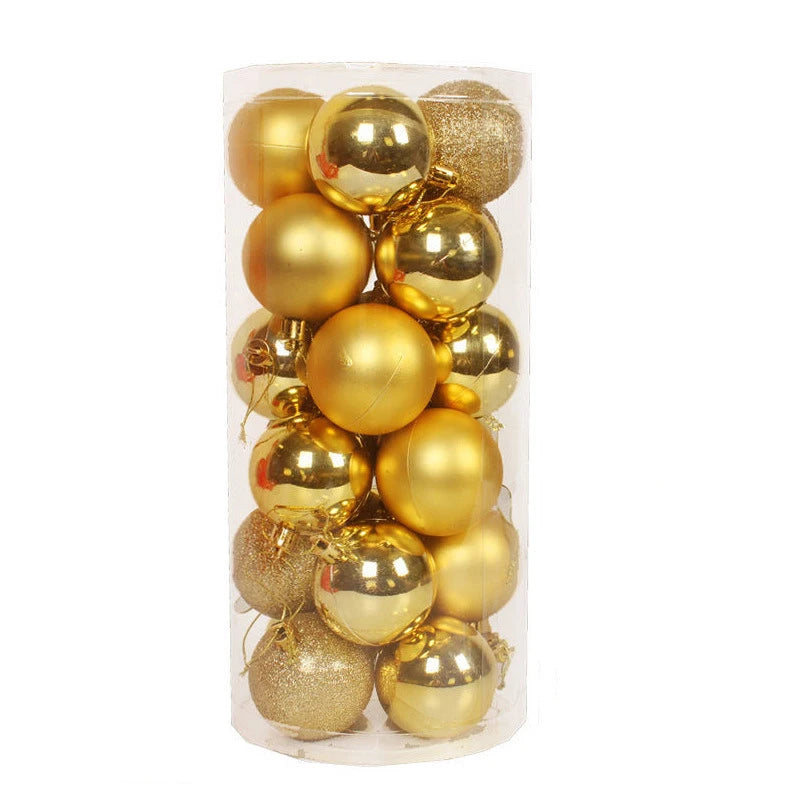Transparent container filled with shiny and matte gold Christmas baubles, some with glitter texture, ideal for festive decorations.