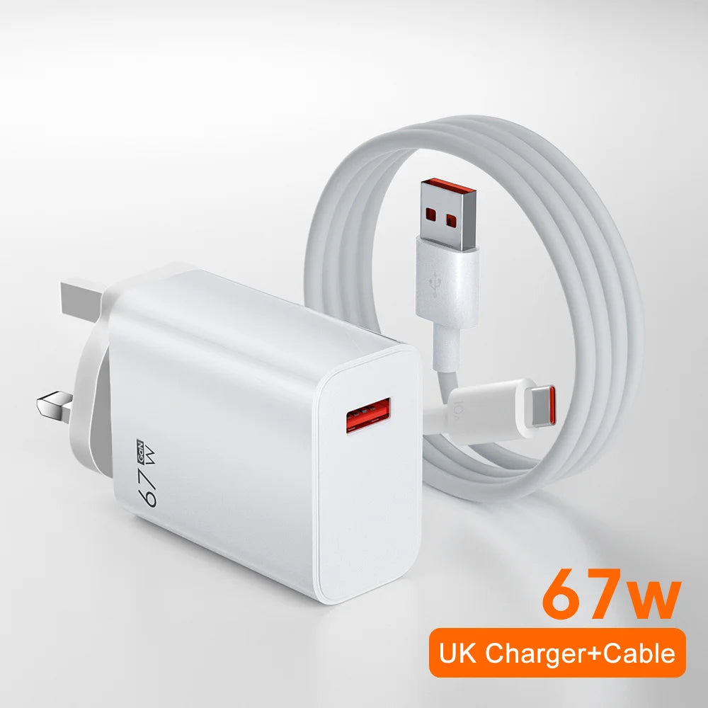 White 67W UK plug USB charger with matching USB-C to USB-A cable. Charger has red USB port and three-pin plug. Text reads "67W UK Charger+Cable" in orange.