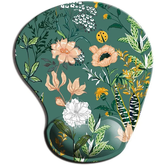 Floral mouse pad with a green background featuring colorful flowers, leaves, and a small ladybug. The design includes shades of peach, white, yellow, and various greens.