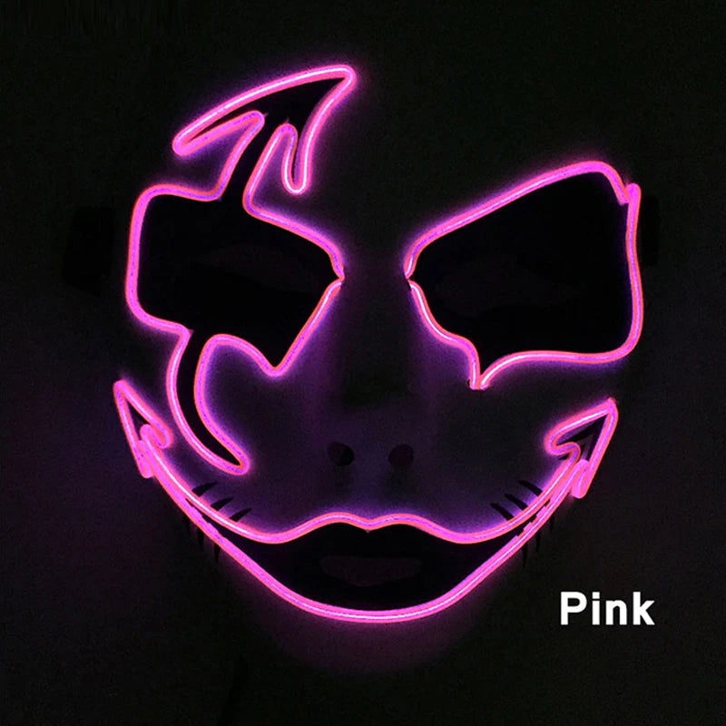 Glowing pink neon mask with exaggerated eyes, brows, and a wide smile, set against a dark background. The word "Pink" is displayed in the bottom right.