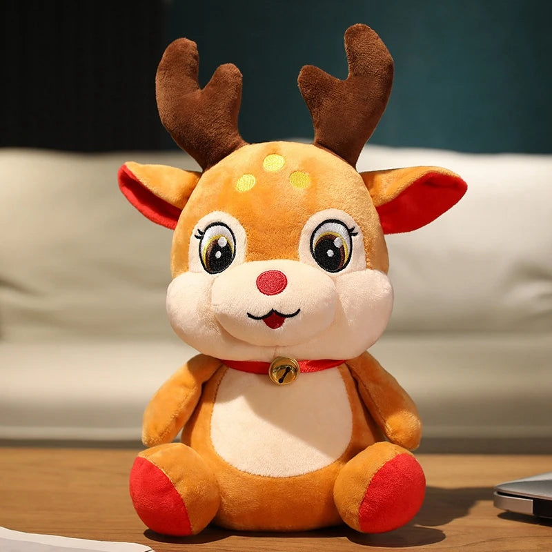 A cute reindeer plush toy with large eyes and a red nose, featuring brown antlers, a red collar with a bell, and vibrant red ears and feet, sitting on a wooden surface.