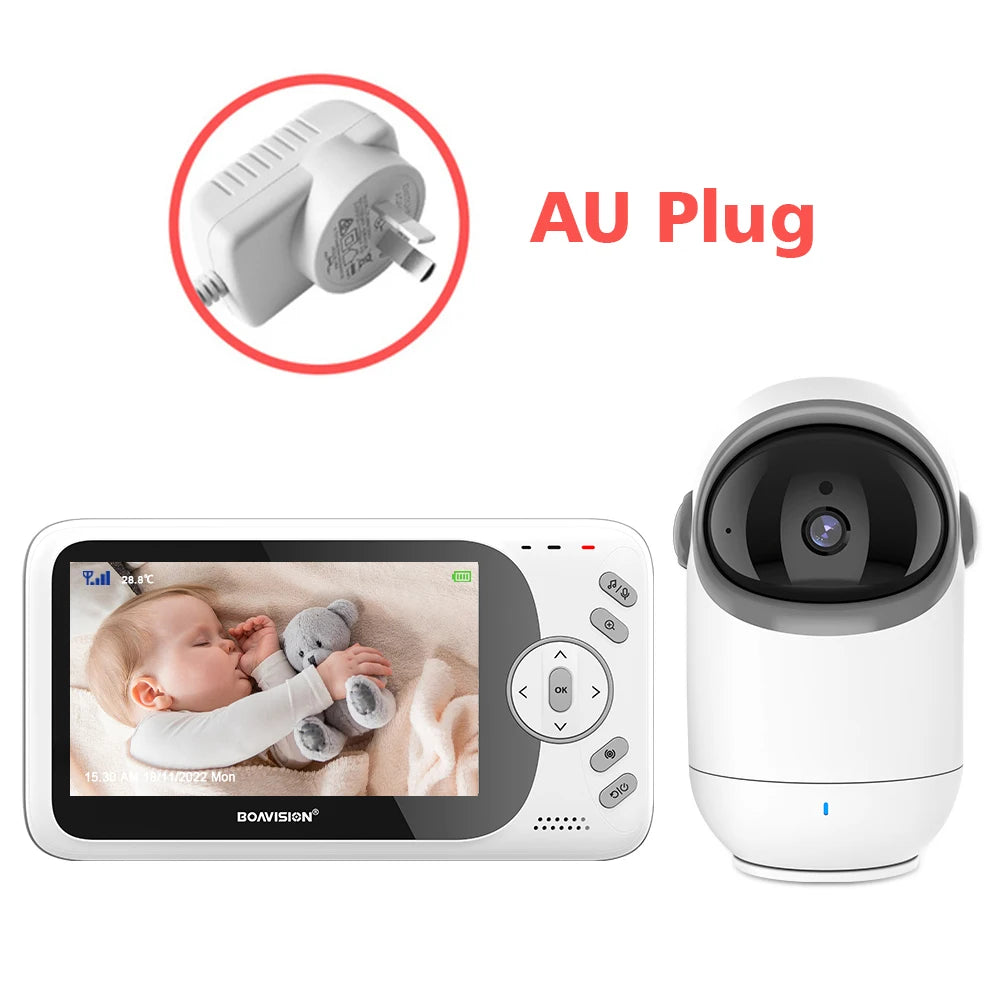 Video baby monitor set with AU plug. The display shows a baby sleeping with a soft toy. A separate camera unit and manual controls are included.