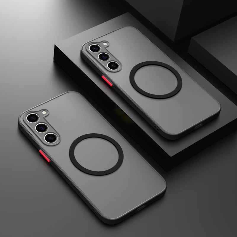 Two sleek gray smartphones with three cameras each, featuring a prominent circular design on the back. Red side buttons stand out against the monochrome background.