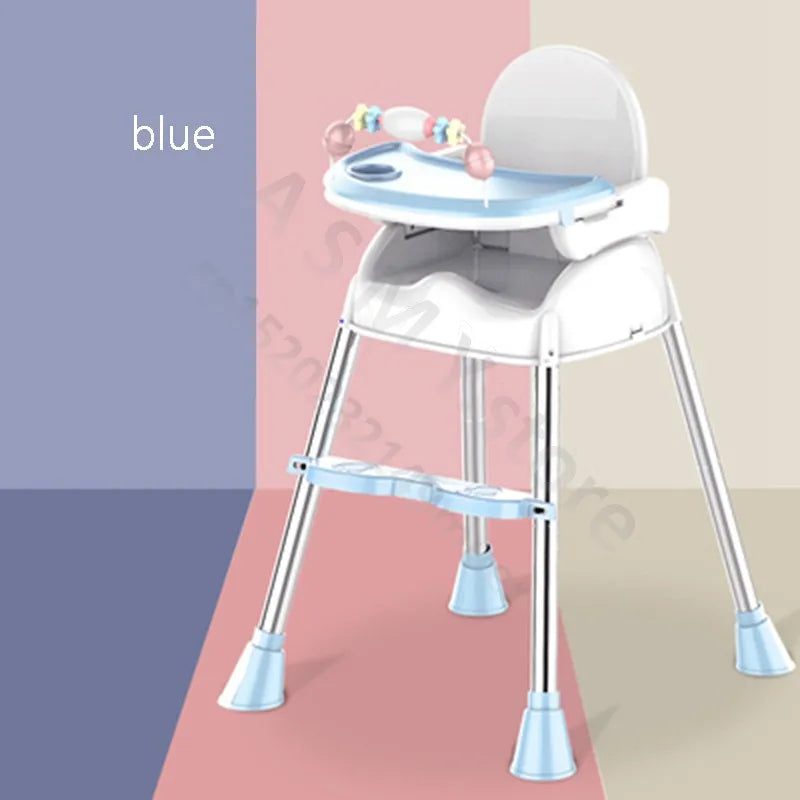 White high chair with blue accents and a playful tray design, featuring colorful toys. It's set against a tri-color background of blue, pink, and beige.