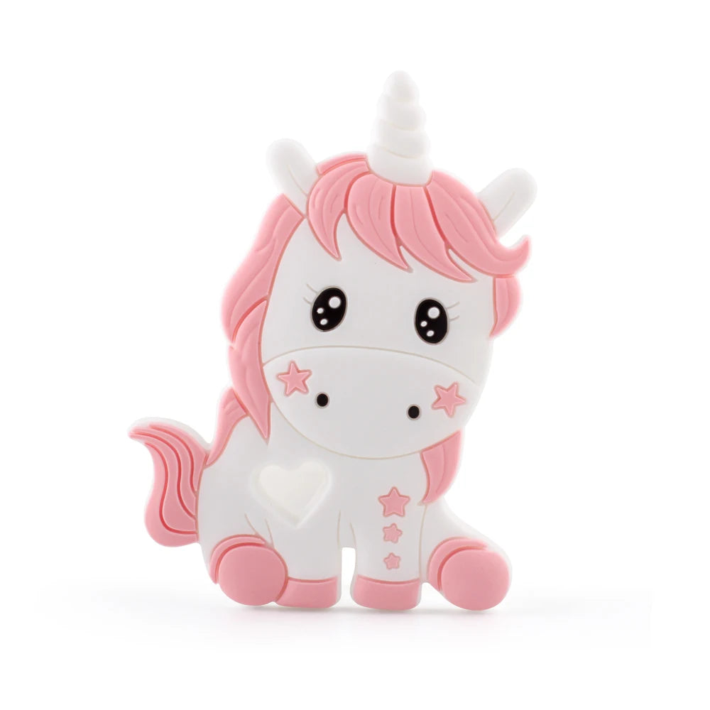 Cute cartoon unicorn with pink mane and tail, sitting. It has large, shiny eyes, a white body with pink stars, and a heart detail on the side.